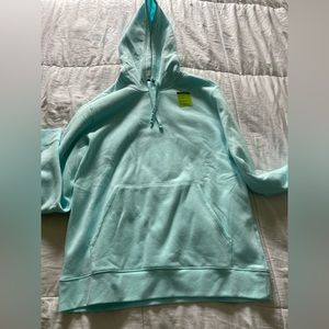 2pc sweatshirts, teal and purple.